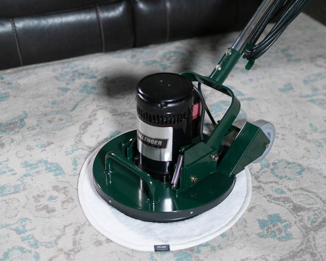 Challenger Orbital Carpet Cleaning Machine cleaning a living room carpet